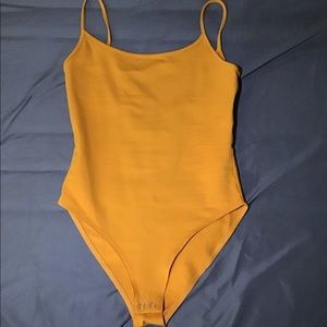 Orange body suit